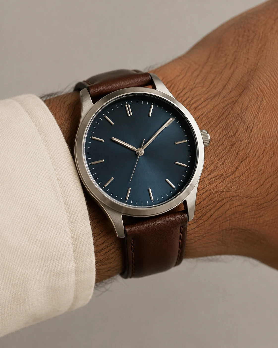 AI-generated close-up of a blue-dial steel watch with a brown leather strap on a wrist