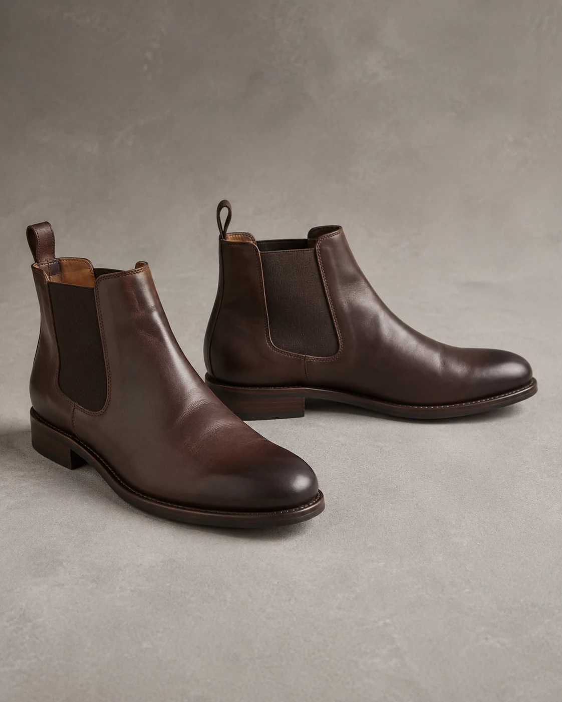 AI-generated dark-brown leather Chelsea boots with elastic side panels