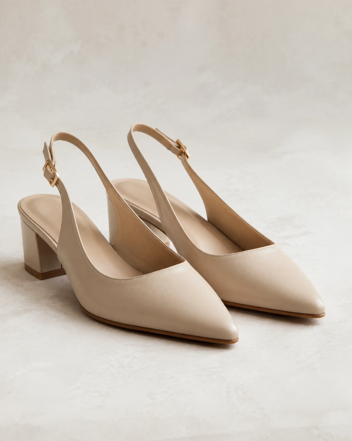 AI-generated champagne-beige slingback pumps with pointed toes and block heels