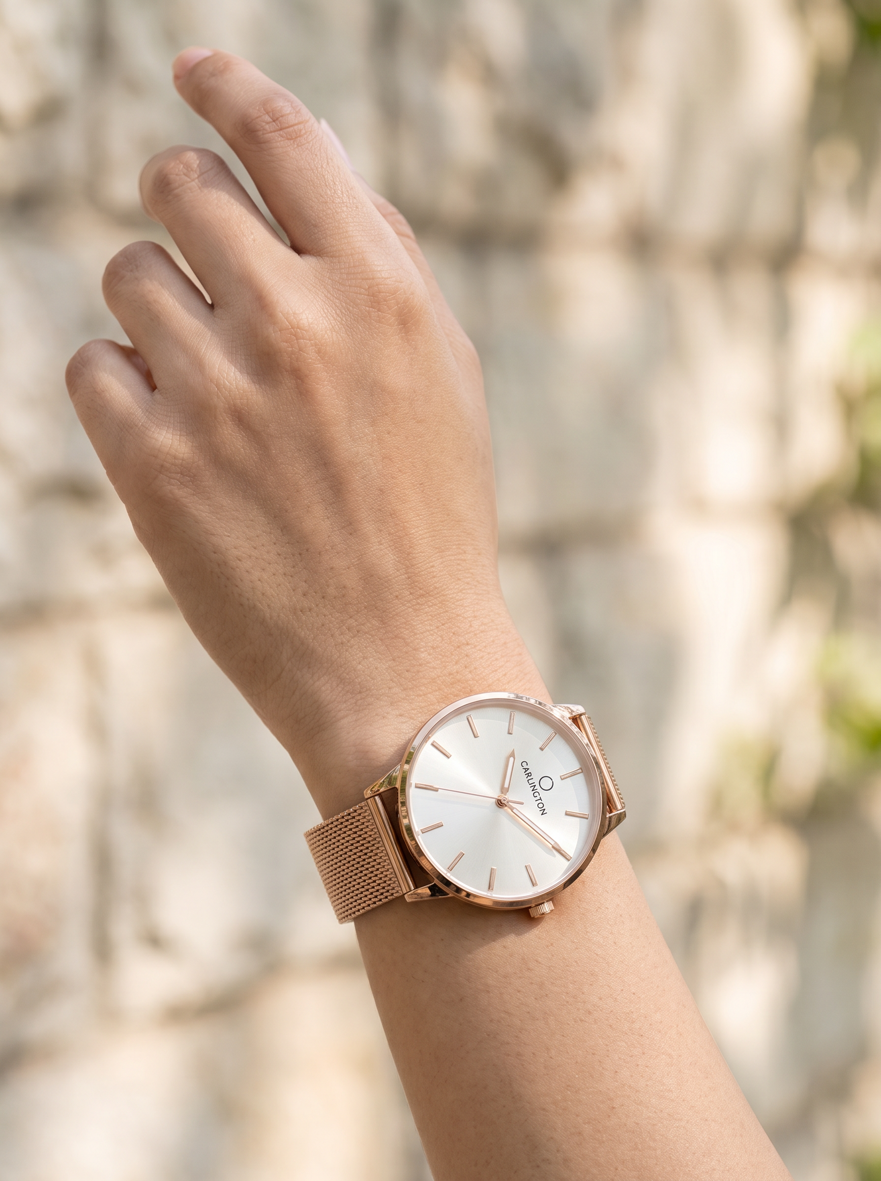 AI-generated product photo of a rose-gold mesh-strap watch on a wrist